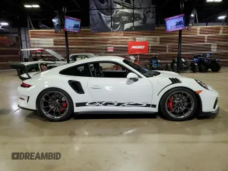 2019 Porsche 911 GT3 RS with VIN WP0AF2A94KS165326, listed as a Copart auction lot 76881844 with 9,991 mi miles and Salvage Title. Bid and sale history available at DreamBid. Image 1.