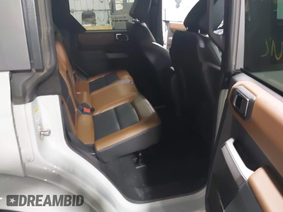 2023 Ford Bronco with VIN 1FMEE5BP7PLC09674, listed as a IAAI auction lot 42049792 with 25,937 mi miles and . Bid and sale history available at DreamBid. Image 8.