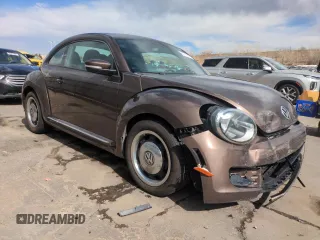 2013 Volkswagen Beetle with VIN 3VWHX7AT8DM603424, listed as a Copart auction lot 51019185 with 136,196 mi miles and Salvage Title. Bid and sale history available at DreamBid. Image 4.