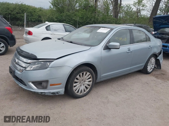 2010 Ford Fusion Hybrid z VIN 3FADP0L36AR200035, wystawiony jako IAAI lot #42145684 z przebiegiem 142 137 mil mil oraz . Historia ofert i sprzedaży dostępna na DreamBid. Obrazek 2.