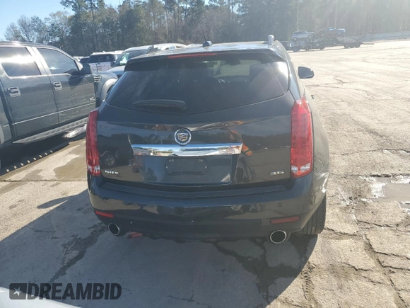 2015 Cadillac SRX Luxury Collection z VIN 3GYFNBE36FS608322, wystawiony jako Copart lot #88860835 z przebiegiem 141 627 mil mil oraz Szkoda całkowita • Salvage title. Historia ofert i sprzedaży dostępna na DreamBid. Obrazek 6.