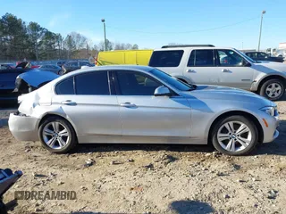 2018 BMW 3 Series 330i with VIN WBA8B9G58JNU97318, listed as a IAAI auction lot 41205434 with 62,582 mi miles and . Bid and sale history available at DreamBid. Image 13.