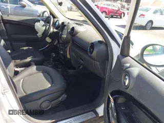 2013 MINI Countryman with VIN WMWZB3C52DWR35806, listed as a IAAI auction lot 42184010 with 93,380 mi miles and . Bid and sale history available at DreamBid. Image 5.