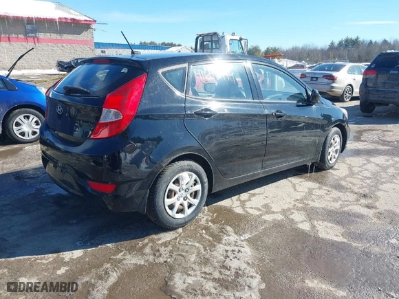 2013 Hyundai Accent GS with VIN KMHCT5AE9DU082462, listed as a IAAI auction lot 41642444 with 160,000 mi miles. Bid and sale history available at carsss.com. Image 4.