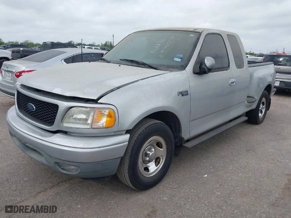 2003 Ford F-150 XL with VIN 1FTRX07253KB95404, listed as a IAAI auction lot 41945734 with 1 mi miles. Bid and sale history available at carsss.com. Image 2.
