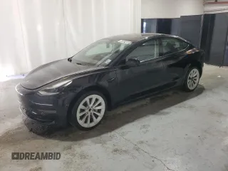 2022 Tesla Model 3 z VIN 5YJ3E1EA1NF286584, wystawiony jako Copart lot #48597405 z przebiegiem 83 340 mil mil oraz Czysty tytuł • Clean title. Historia ofert i sprzedaży dostępna na DreamBid. Obrazek 1.