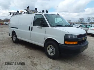 2018 Chevrolet Express Cargo Van with VIN 1GCWGAFP1J1322142, listed as a IAAI auction lot 41952498 with 155,218 mi miles. Bid and sale history available at carsss.com. Image 1.