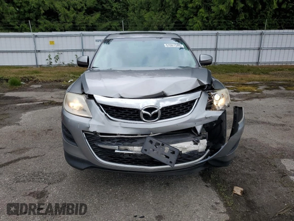 2011 Mazda CX-9 Touring with VIN JM3TB3CV7B0326839, listed as a Copart auction lot 57061345 with 111,832 mi miles and Salvage title. Bid and sale history available at DreamBid. Image 5.
