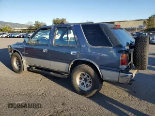 1995 Isuzu Rodeo z VIN 4S2CM58V2S4361566, wystawiony jako Copart lot #48424065 z przebiegiem 241 207 mil mil oraz Czysty tytuł • Clean title. Historia ofert i sprzedaży dostępna na DreamBid. Obrazek 2.