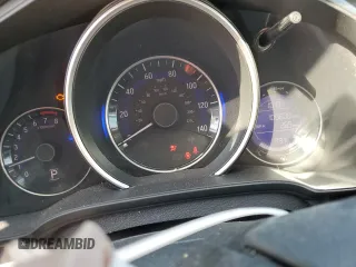 2015 Honda Fit LX с VIN 3HGGK5H59FM757797, выставлен на аукционе Copart как лот 58615175 с пробегом 109 608 миль миль и Списание • Salvage title. История ставок и продаж доступна на DreamBid. Изображение 9.