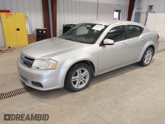 2012 Dodge Avenger SXT with VIN 1C3CDZCB5CN219812, listed as a IAAI auction lot 41928110 with 200,557 mi miles and . Bid and sale history available at carsss.com. Image 2.