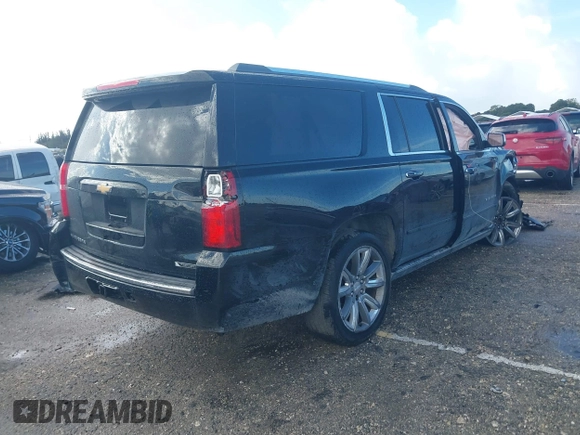 2018 Chevrolet Suburban Premier with VIN 1GNSCJKC2JR199702, listed as a IAAI auction lot 41136128 with 80,103 mi miles and . Bid and sale history available at DreamBid. Image 4.