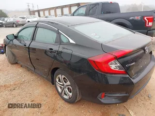 2018 Honda Civic LX with VIN 2HGFC2F55JH595412, listed as a IAAI auction lot 40510936 with 74,359 mi miles and . Bid and sale history available at DreamBid. Image 3.