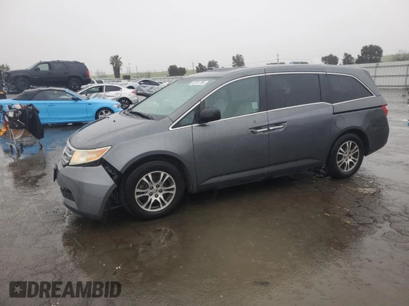 2011 Honda Odyssey EX-L with VIN 5FNRL5H64BB050425, listed as a Copart auction lot 49101795 with 192,238 mi miles and Salvage Title. Bid and sale history available at DreamBid. Image 1.