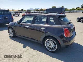 2015 MINI Hardtop 4 Door z VIN WMWXS5C57FT829133, wystawiony jako Copart lot #58764405 z przebiegiem 63 774 mil mil oraz Szkoda całkowita • Salvage title. Historia ofert i sprzedaży dostępna na DreamBid. Obrazek 2.