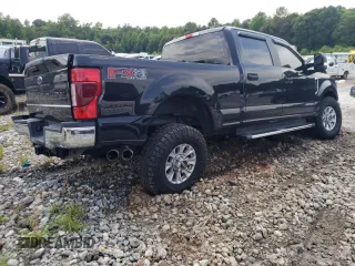 2020 Ford F-250 XL with VIN 1FT8W2BTXLEE30615, listed as a Copart auction lot 60626295 with 142,318 mi miles and Salvage title. Bid and sale history available at DreamBid. Image 3.