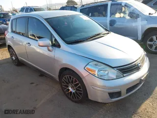 2011 Nissan Versa 1.8 S with VIN 3N1BC1CP2BL448005, listed as a IAAI auction lot 41819138 with 165,936 mi miles. Bid and sale history available at carsss.com. Image 1.
