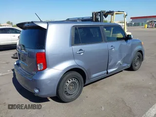 2012 Scion xB with VIN JTLZE4FE0CJ029259, listed as a IAAI auction lot 42272635 with 211,235 mi miles and . Bid and sale history available at DreamBid. Image 4.
