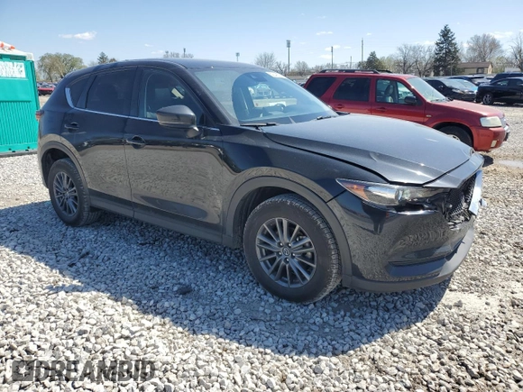 2021 Mazda CX-5 Touring z VIN JM3KFBCM5M0438706, wystawiony jako Copart lot #52048075 z przebiegiem 50 288 mil mil oraz Szkoda całkowita • Salvage title. Historia ofert i sprzedaży dostępna na DreamBid. Obrazek 4.
