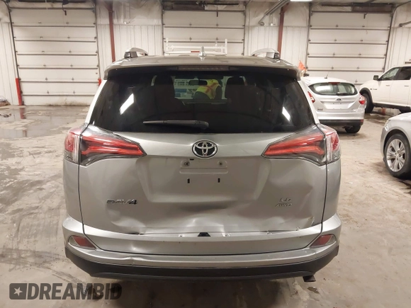 2016 Toyota RAV4 LE with VIN 2T3BFREV8GW509257, listed as a IAAI auction lot 41807349 with 216,031 mi miles. Bid and sale history available at carsss.com. Image 16.