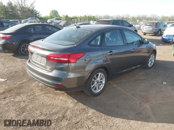 2016 Ford Focus SE with VIN 1FADP3F2XGL207906, listed as a IAAI auction lot 42099203 with 95,527 mi miles. Bid and sale history available at carsss.com. Image 4.