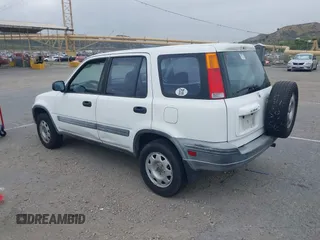 2000 Honda CR-V LX with VIN JHLRD2844YS000620, listed as a IAAI auction lot 42081400 with 259,781 mi miles. Bid and sale history available at carsss.com. Image 3.