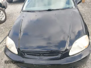 1997 Honda Civic DX with VIN 1HGEJ6125VL095006, listed as a IAAI auction lot 41473812 with 264,966 mi miles. Bid and sale history available at carsss.com. Image 10.