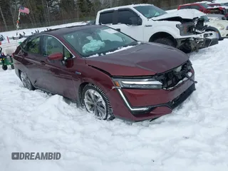 2018 Honda Clarity z VIN JHMZC5F17JC012009, wystawiony jako IAAI lot #41498274 z przebiegiem 94 240 mil mil oraz . Historia ofert i sprzedaży dostępna na DreamBid. Obrazek 1.