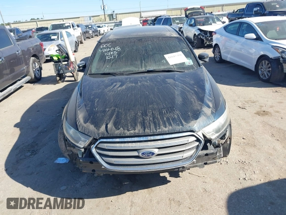 2014 Ford Taurus SEL z VIN 1FAHP2E84EG170133, wystawiony jako IAAI lot #41045369 z przebiegiem 261 732 mil mil oraz . Historia ofert i sprzedaży dostępna na DreamBid. Obrazek 13.