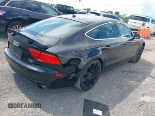 2012 Audi A7 Premium Plus with VIN WAUYGAFC0CN087604, listed as a IAAI auction lot 42747927 with 155,662 mi miles and . Bid and sale history available at DreamBid. Image 4.
