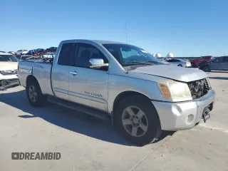 2005 Nissan Titan SE z VIN 1N6AA06AX5N500773, wystawiony jako Copart lot #81695634 z przebiegiem 127 210 mil mil oraz Szkoda całkowita • Salvage title. Historia ofert i sprzedaży dostępna na DreamBid. Obrazek 4.