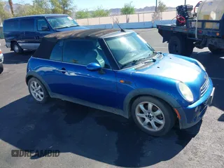 2007 MINI Convertible with VIN WMWRF33507TG16644, listed as a IAAI auction lot 40058098 with 163,215 mi miles and . Bid and sale history available at DreamBid. Image 1.