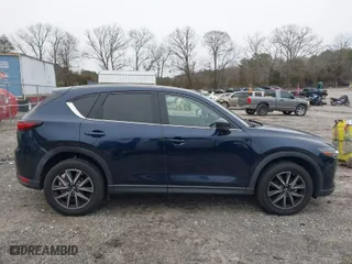 2017 Mazda CX-5 Grand Touring with VIN JM3KFBDL9H0180038, listed as a IAAI auction lot 41394047 with 111,581 mi miles. Bid and sale history available at carsss.com. Image 13.
