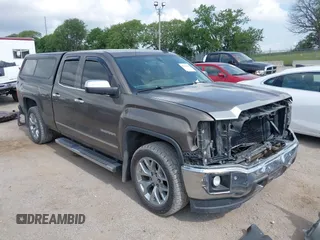 2014 GMC Sierra 1500 SLT with VIN 1GTR1VEC1EZ133972, listed as a IAAI auction lot 42502436 with 149,731 mi miles and . Bid and sale history available at DreamBid. Image 1.