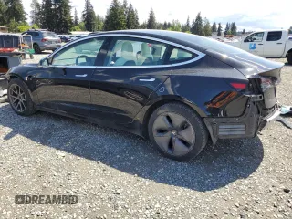 2020 Tesla Model 3 Long Range z VIN 5YJ3E1EBXLF795689, wystawiony jako Copart lot #56703555 z przebiegiem 62 556 mil mil oraz Szkoda całkowita • Salvage title. Historia ofert i sprzedaży dostępna na DreamBid. Obrazek 2.