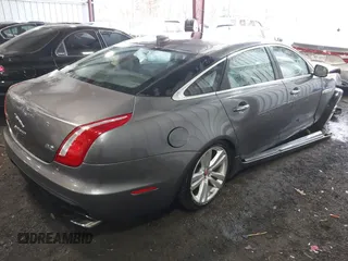 2016 Jaguar XJ Portfolio with VIN SAJWJ2GD7G8W02919, listed as a IAAI auction lot 41490211 with 170,768 mi miles and . Bid and sale history available at DreamBid. Image 4.