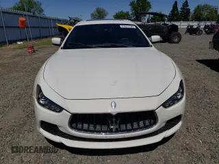 2016 Maserati Ghibli z VIN ZAM57XSA8G1166993, wystawiony jako Copart lot #51677735 z przebiegiem 58 215 mil mil oraz Tytuł czysty. Historia ofert i sprzedaży dostępna na DreamBid. Obrazek 5.