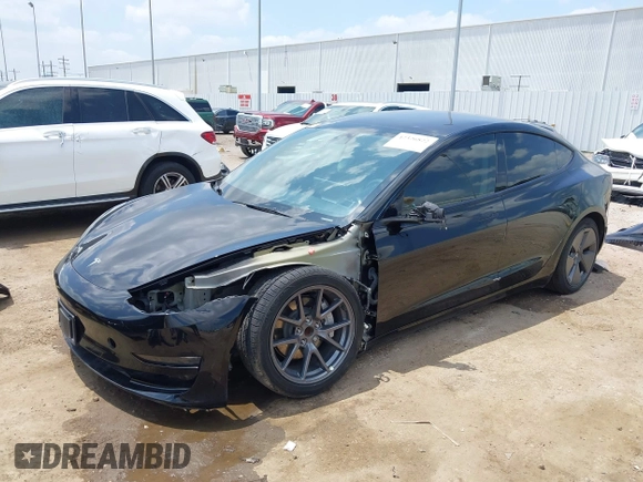 2023 Tesla Model 3 with VIN 5YJ3E1EA8PF454210, listed as a IAAI auction lot 42326822 with 43,200 mi miles and . Bid and sale history available at DreamBid. Image 2.