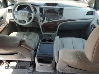 2012 Toyota Sienna XLE AAS with VIN 5TDYK3DC3CS237344, listed as a Copart auction lot 63271815 with 105,860 mi miles and Salvage title. Bid and sale history available at DreamBid. Image 8.