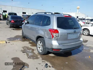 2016 Subaru Forester 2.5i Premium with VIN JF2SJADC8GH549569, listed as a IAAI auction lot 41828984 with 96,413 mi miles. Bid and sale history available at carsss.com. Image 3.
