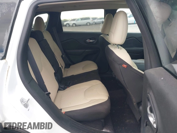 2016 Jeep Cherokee Latitude z VIN 1C4PJMCS4GW332918, wystawiony jako IAAI lot #42447507 z przebiegiem 97 575 mil mil oraz . Historia ofert i sprzedaży dostępna na DreamBid. Obrazek 8.