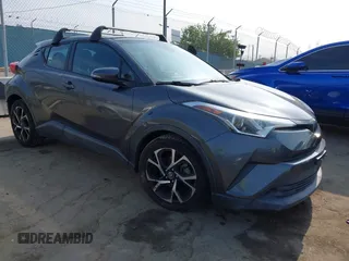 2018 Toyota C-HR XLE z VIN NMTKHMBX6JR040504, wystawiony jako IAAI lot #42417238 z przebiegiem 102 302 mil mil oraz . Historia ofert i sprzedaży dostępna na DreamBid. Obrazek 1.