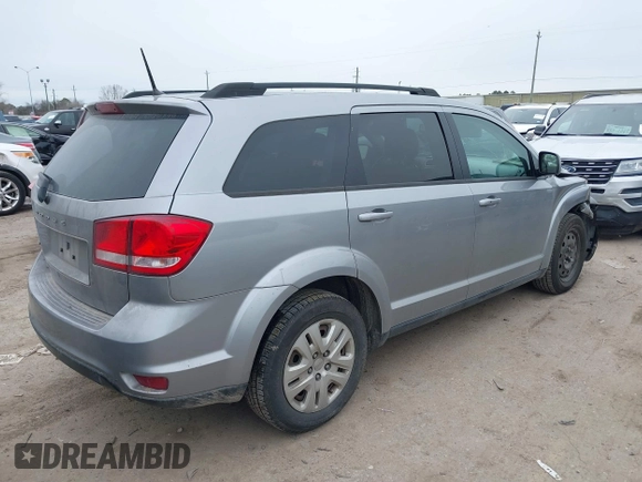 2019 Dodge Journey SE with VIN 3C4PDCBB0KT816103, listed as a IAAI auction lot 41640272 with 118,310 mi miles and . Bid and sale history available at DreamBid. Image 4.