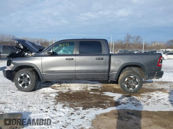2022 Ram 1500 Rebel z VIN 1C6SRFLT9NN204868, wystawiony jako IAAI lot #41351273 z przebiegiem 67 120 mil mil oraz . Historia ofert i sprzedaży dostępna na DreamBid. Obrazek 14.