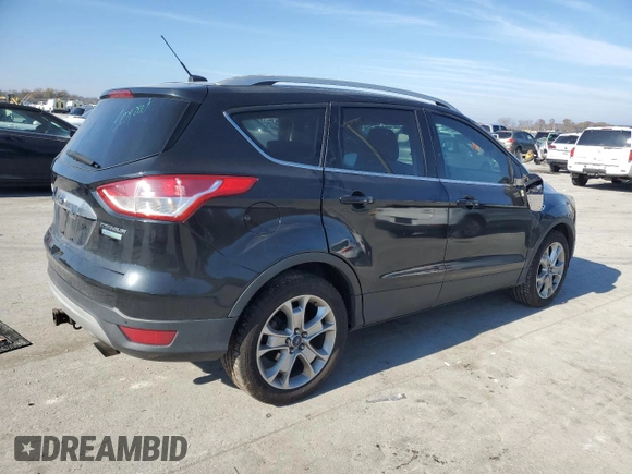 2015 Ford Escape Titanium with VIN 1FMCU0J9XFUB45185, listed as a Copart auction lot 82415114 with 272,818 mi miles and Salvage Title. Bid and sale history available at DreamBid. Image 3.