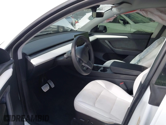2022 Tesla Model Y Performance with VIN 7SAYGDEF1NF559572, listed as a IAAI auction lot 41516070 with 43,240 mi miles and . Bid and sale history available at DreamBid. Image 5.