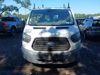 2016 Ford Transit Cargo with VIN 1FTYR1ZM2GKB06257, listed as a IAAI auction lot 42851308 with 239,006 mi miles and . Bid and sale history available at DreamBid. Image 12.