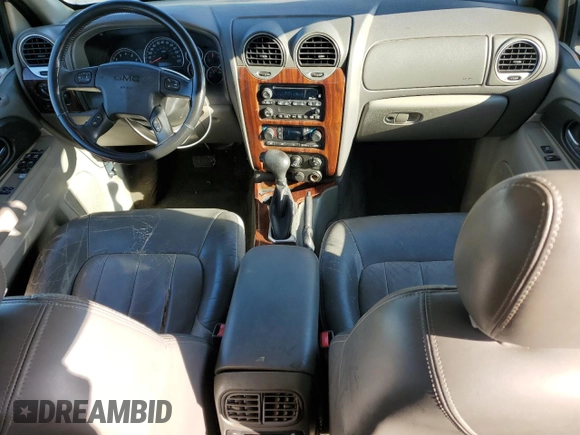 2002 GMC Envoy SLT with VIN 1GKDT13S122491329, listed as a Copart auction lot 75161714 with 149,659 mi miles and Salvage Title. Bid and sale history available at DreamBid. Image 8.