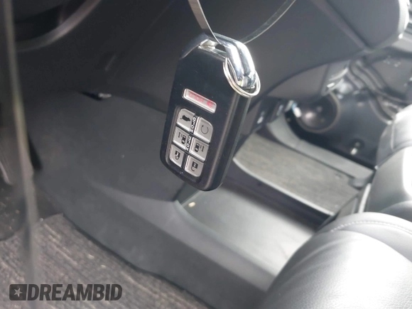 2023 Honda Odyssey Touring with VIN 5FNRL6H81PB068721, listed as a IAAI auction lot 41489618 with 20,202 mi miles and . Bid and sale history available at DreamBid. Image 11.