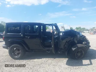 2016 Jeep Wrangler Unlimited Sahara with VIN 1C4BJWEG8GL253803, listed as a IAAI auction lot 42296118 with 163,463 mi miles and . Bid and sale history available at DreamBid. Image 13.